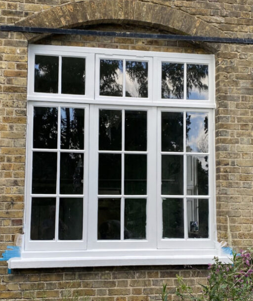 Restored white timber window after repair